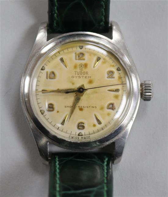 A gentlemans stainless steel mid-size Tudor Oyster wrist watch, on associated strap.